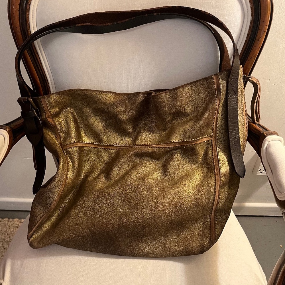 HOLDING HORSES from ANTHROPOLGIE ANTIQUE GOLD HOBO BAG